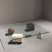 Glass Table with Geometric Objects
